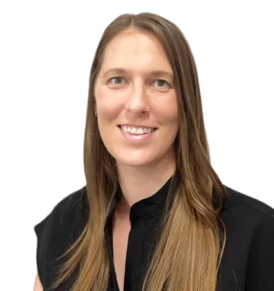 Smiling woman with long brown hair, wearing a black shirt, against a transparent background.