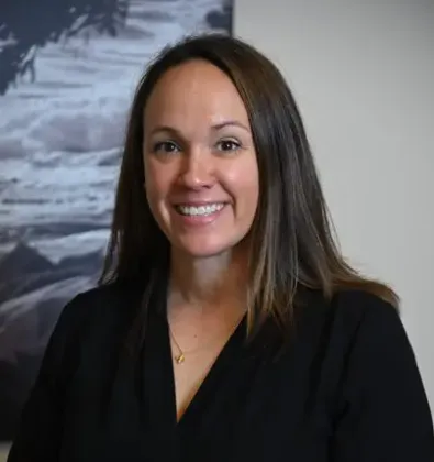 a woman smiling at the camera