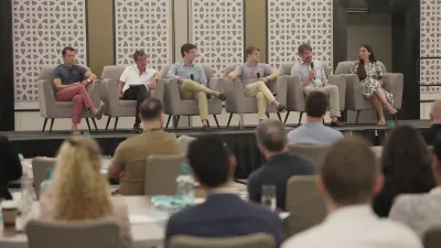 a group of people sitting in chairs