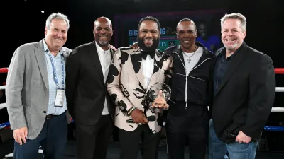 Tom Lorz, Anthony Anderson, Chris Spencer et al. are posing for a picture