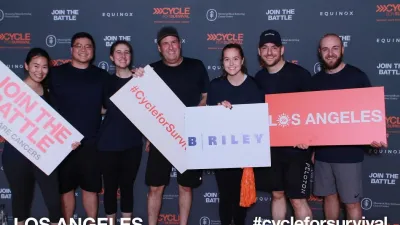 a group of people posing for a photo