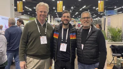 a group of men posing for a photo