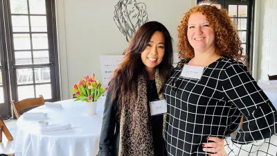 a couple of women smiling