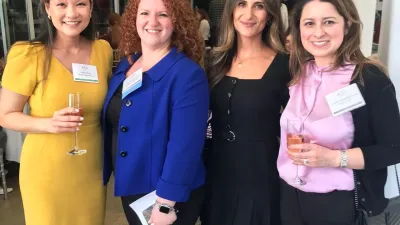 a group of women posing for a photo