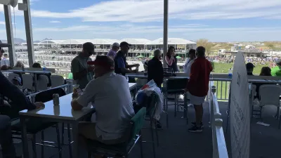 a group of people sitting at tables