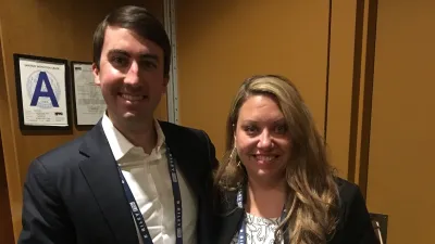 a man and woman posing for the camera