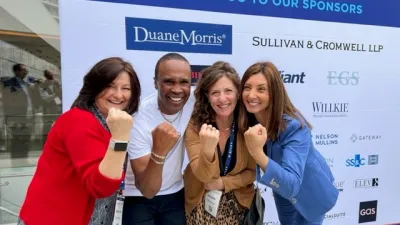 Sugar Ray Leonard et al. posing for a photo