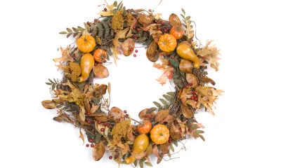 a close up of a fall wreath