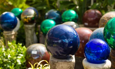 a glass with a blue ball