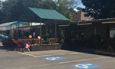 an empty parking lot in front of a building