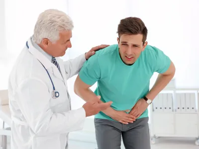 a doctor checking a patient's pulse