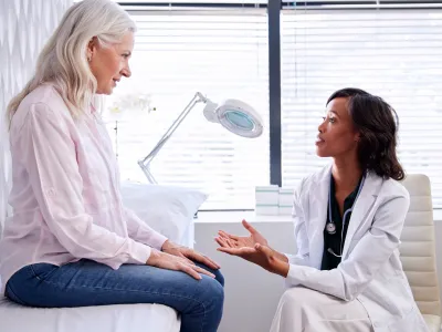 a doctor talking to a patient