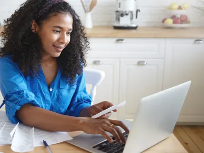 a woman working on her laptop