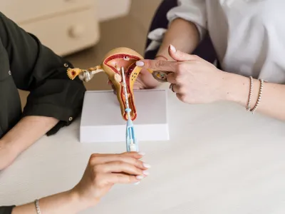 a person holding a syringe