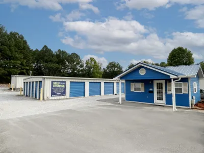 a blue building with a sign