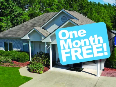 a house with a sign in front