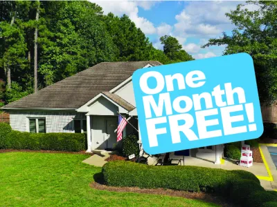 a sign in front of a house