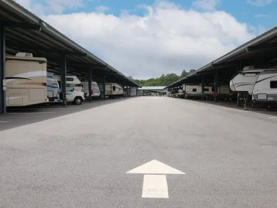 a group of rvs parked at a gas station