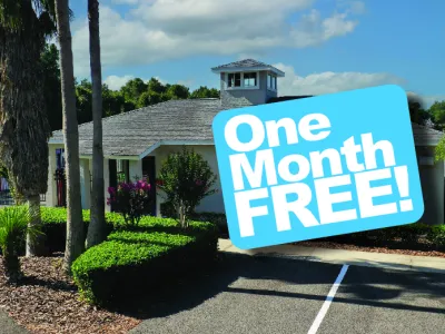 a sign in front of a house