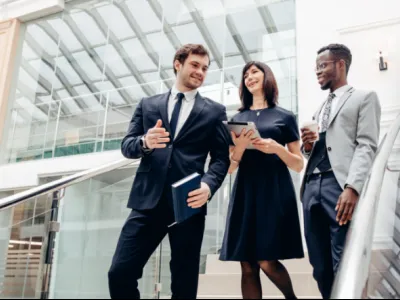 a group of people standing in a building