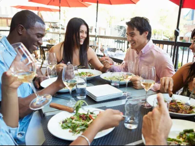 a group of people eating at a table