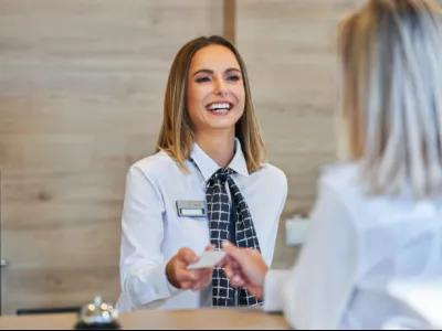 a woman in a white coat