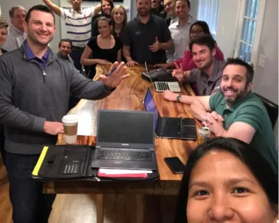 a group of people posing for the camera