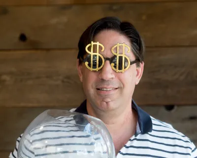 a man holding a wine glass