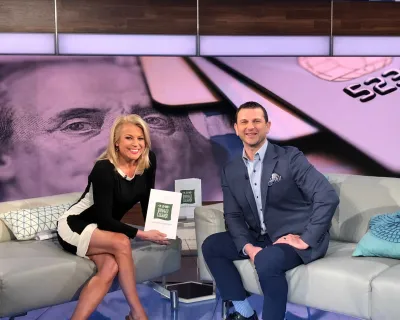 Susan Hendricks, Ted Jenkin sitting posing for the camera