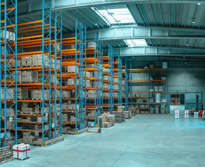 a warehouse with shelves and boxes