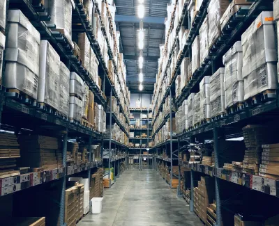 a long hallway with many bookshelves