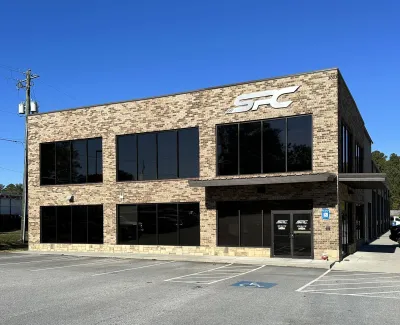 a building with a parking lot