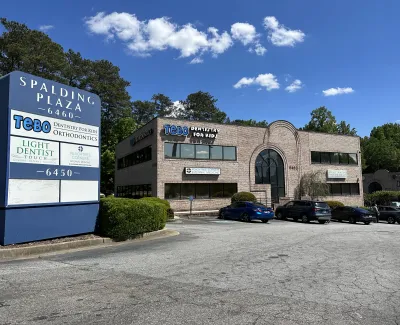 a building with a sign in front of it