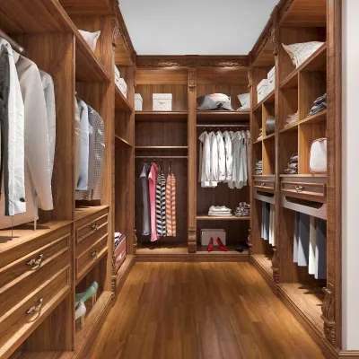 Elegant wooden walk-in closet featuring organized clothing, shoes, and accessories for luxurious storage.