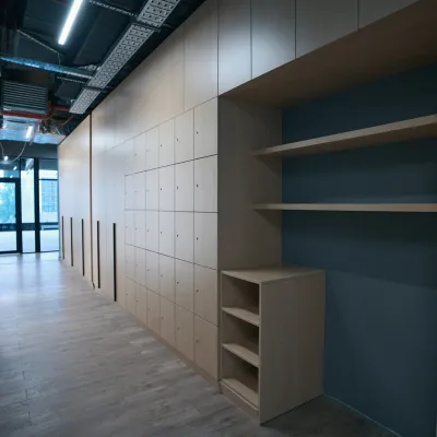 a room with shelves and a door