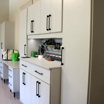 a kitchen with white cabinets