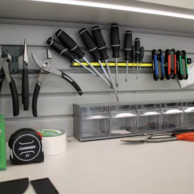 a garage counter full of tools