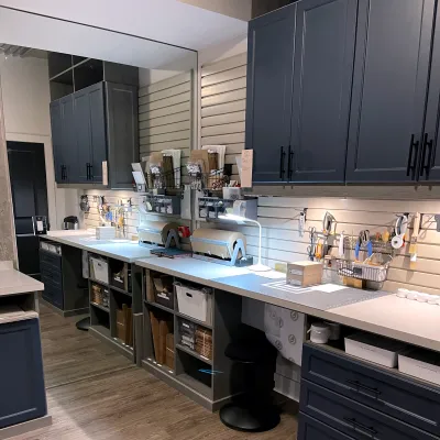 a kitchen with black cabinets