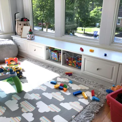 a room with a table and toys