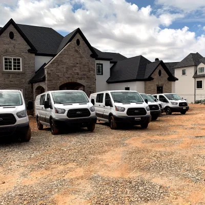 artisan custom closets installation vans in front of new construction