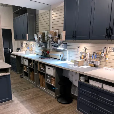 a kitchen with black cabinets