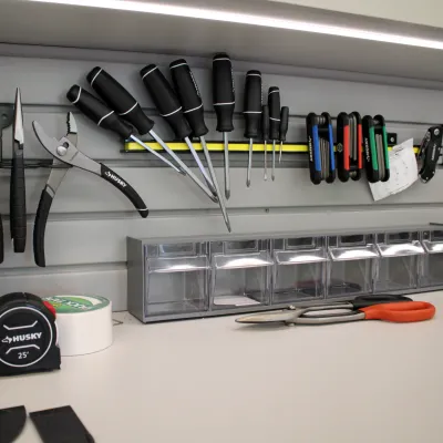 a kitchen counter full of knives