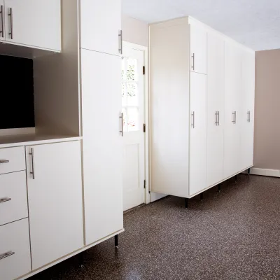 a room with white cabinets