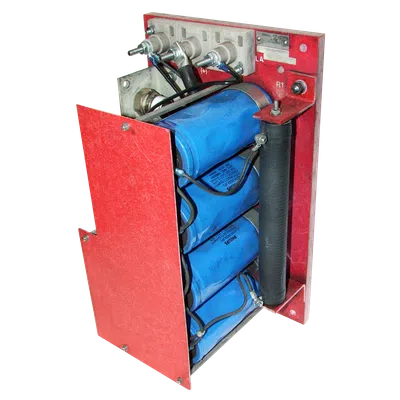 Red metal frame housing three large blue capacitors connected with wiring and terminals for electrical circuits.