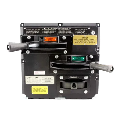 Black industrial controller panel with dynamic brake and power throttle levers and operational instructions.