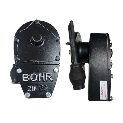 Black mechanical device with embossed BOHR 20 60 and attached components on transparent background