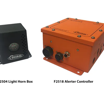 Black F2504 light horn box and orange F2518 alerter controller with connectors, both for alert systems.