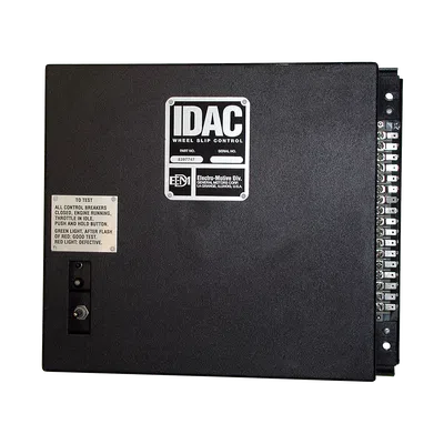 Black IDAC wheel slip control electronic unit from Electro-Motive Division with labels and switches