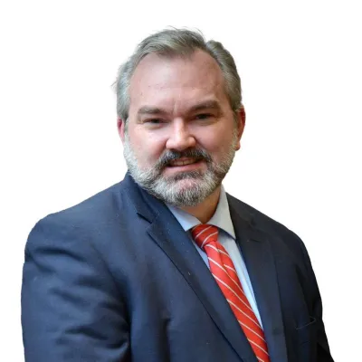 a man wearing a suit and tie