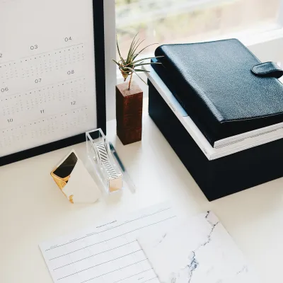 a tablet and a notebook